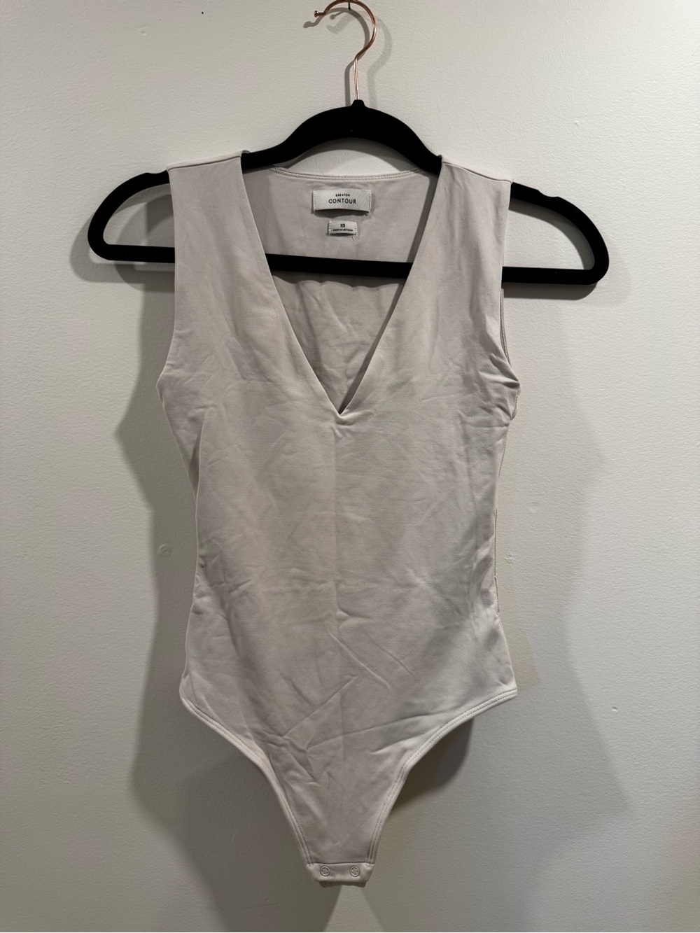 Babaton Sleeveless V-Neck Bodysuit in Cream XS